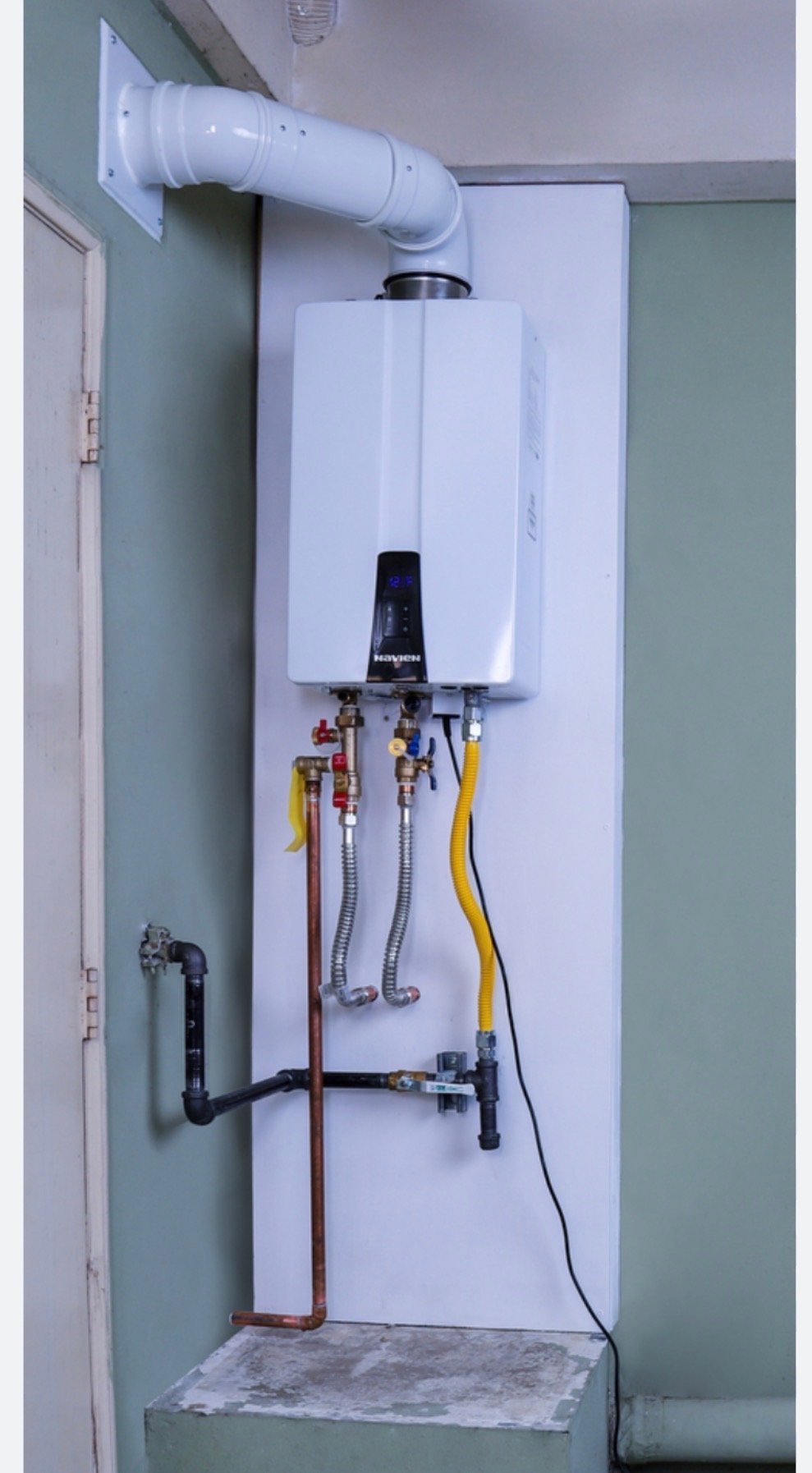 Tankless water heater installation — Humble Roots Plumbing